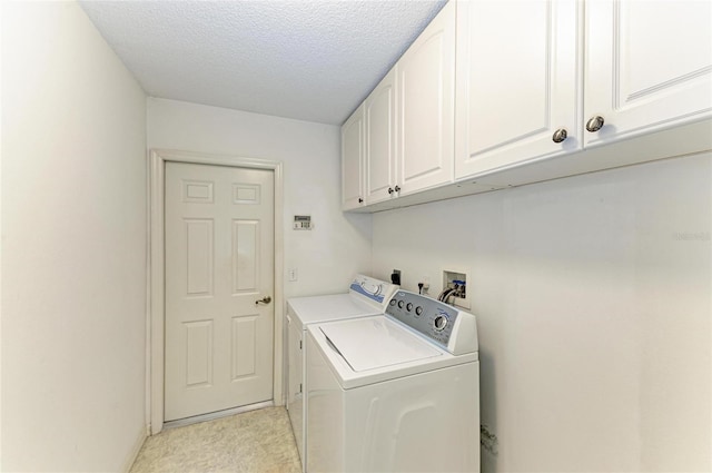 7824 48th Pl E, Bradenton, FL 34203 - laundry area with cabinet space, independent washer and dryer, and a textured ceiling