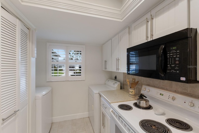 4414 Mount Vernon Dr Unit 1, Bradenton, FL 34210 - kitchen featuring black microwave, white electric stove, independent washer and dryer, light countertops, and white cabinets