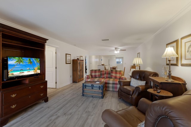 4414 Mount Vernon Dr Unit 1, Bradenton, FL 34210 - living room featuring ornamental molding, light wood-style flooring, and a ceiling fan