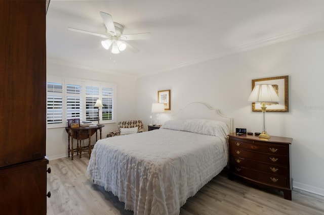 4414 Mount Vernon Dr Unit 1, Bradenton, FL 34210 - bedroom with ornamental molding, light wood-style floors, and a ceiling fan
