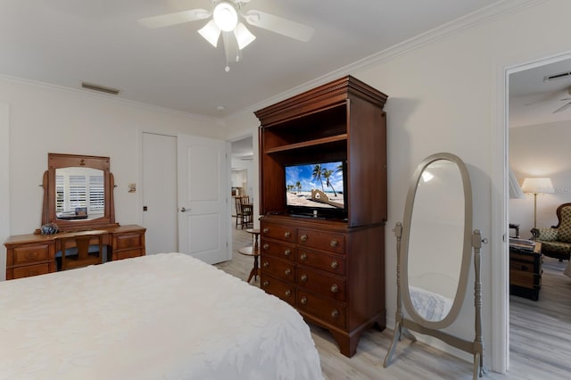 4414 Mount Vernon Dr Unit 1, Bradenton, FL 34210 - bedroom featuring light wood finished floors, crown molding, and ceiling fan