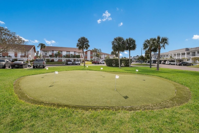 4414 Mount Vernon Dr Unit 1, Bradenton, FL 34210 - view of community with a putting green, a residential view, and a lawn