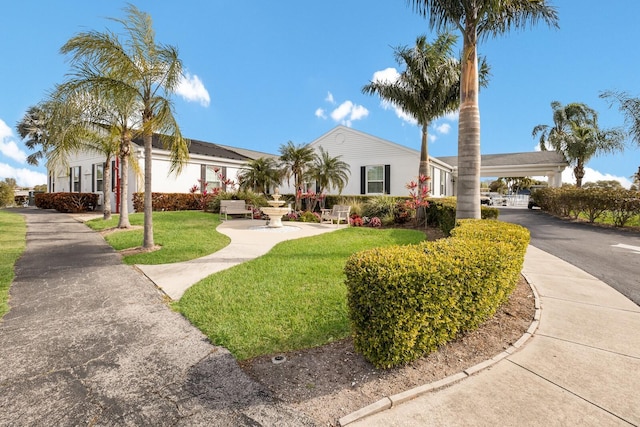 4414 Mount Vernon Dr Unit 1, Bradenton, FL 34210 - ranch-style home featuring a front lawn