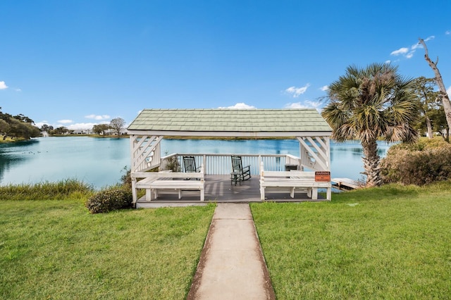 4414 Mount Vernon Dr Unit 1, Bradenton, FL 34210 - dock area featuring a lawn and a deck with water view
