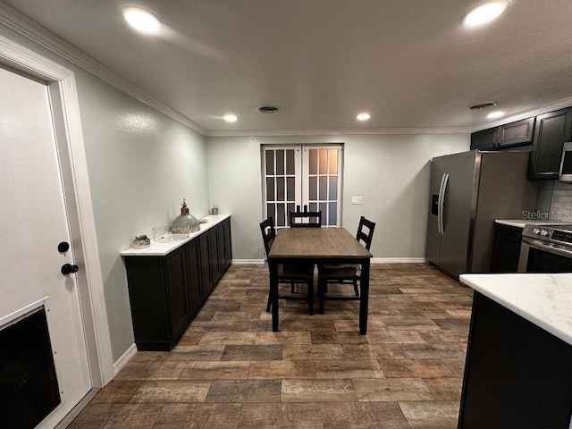 611 Missouri Rd, Venice, FL 34293 - dining space featuring crown molding, recessed lighting, french doors, and dark wood-type flooring