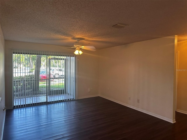 4002 Crockers Lake Blvd Unit 11, Sarasota, FL 34238 - empty room with ceiling fan, dark wood finished floors, and a textured ceiling