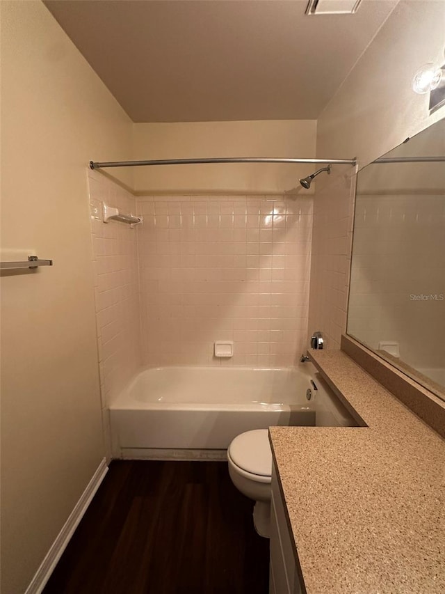 4002 Crockers Lake Blvd Unit 11, Sarasota, FL 34238 - full bath with vanity, shower / bath combination, and wood finished floors