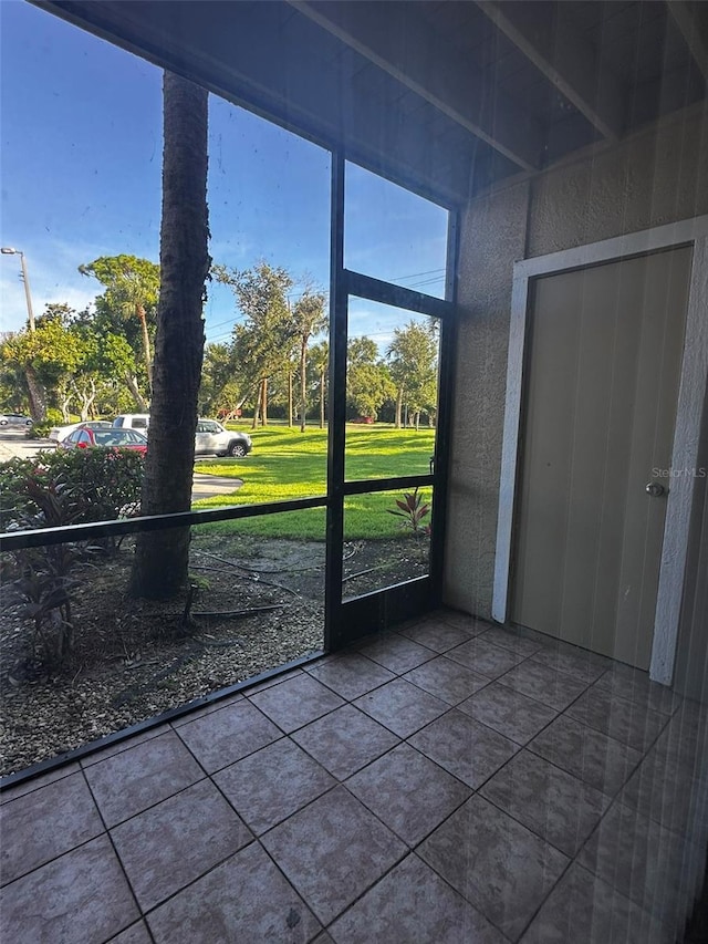 4002 Crockers Lake Blvd Unit 11, Sarasota, FL 34238 - view of unfurnished sunroom