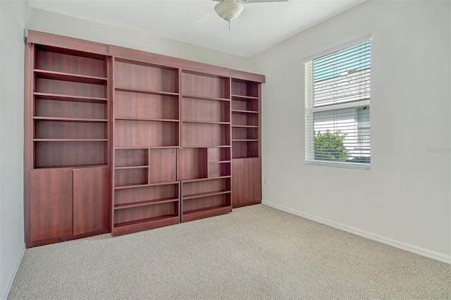 12113 Whistling Way, Lakewood Ranch, FL 34202 - carpeted spare room with baseboards and ceiling fan
