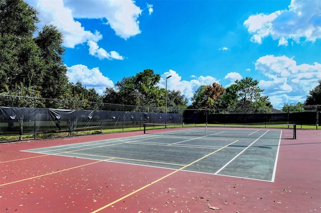 12113 Whistling Way, Lakewood Ranch, FL 34202 - view of tennis court with community basketball court
