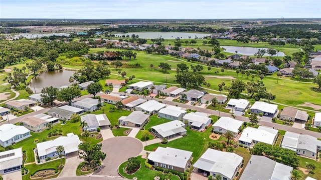 8470 Imperial Cir, Palmetto, FL 34221 - aerial perspective of suburban area with a nearby body of water and a local golf course