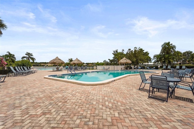 8470 Imperial Cir, Palmetto, FL 34221 - community pool with a patio area