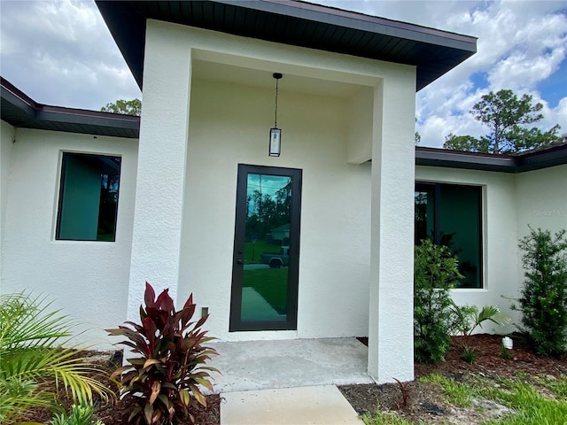 3616 Bellefonte Ave, North Port, FL 34286 - view of exterior entry featuring stucco siding