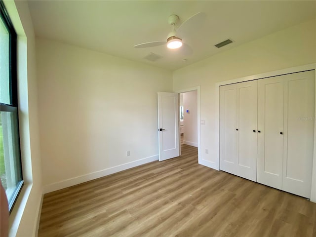 3616 Bellefonte Ave, North Port, FL 34286 - unfurnished bedroom featuring light wood-style floors, a closet, and ceiling fan