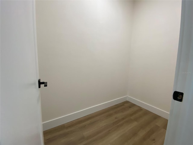 3616 Bellefonte Ave, North Port, FL 34286 - empty room with wood finished floors and baseboards