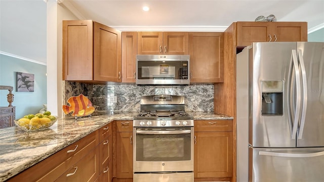 5524 Antilles Dr, Sarasota, FL 34231 - kitchen with stainless steel appliances, ornamental molding, light stone countertops, backsplash, and brown cabinets