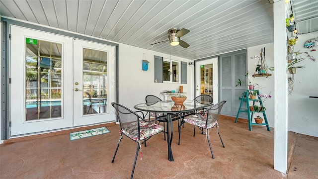 5524 Antilles Dr, Sarasota, FL 34231 - sunroom featuring french doors, a ceiling fan, and outdoor dining area