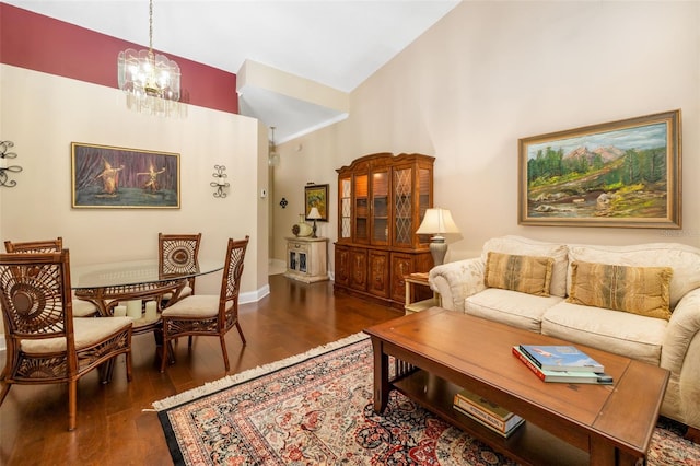 2411 New Haven Cir Unit 70, Sun City Center, FL 33573 - living area featuring wood finished floors, a chandelier, and high vaulted ceiling