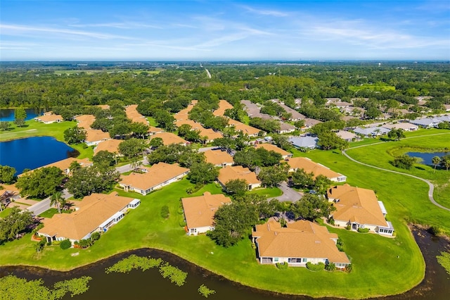 2411 New Haven Cir Unit 70, Sun City Center, FL 33573 - aerial perspective of suburban area with a large body of water