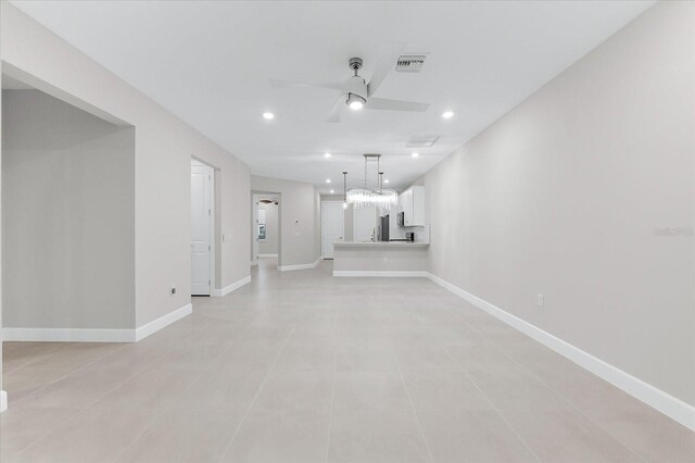 7661 Summerland Cv, Bradenton, FL 34202 - unfurnished living room featuring ceiling fan, recessed lighting, and light tile patterned flooring