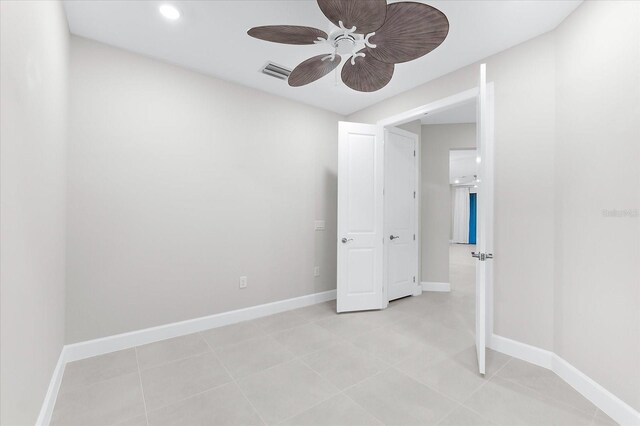 7661 Summerland Cv, Bradenton, FL 34202 - empty room with ceiling fan and recessed lighting