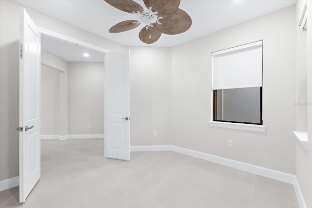 7661 Summerland Cv, Bradenton, FL 34202 - empty room with a ceiling fan, recessed lighting, and light tile patterned floors