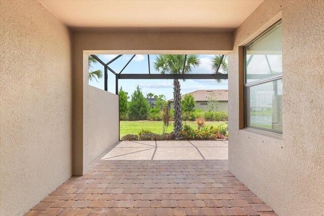 7661 Summerland Cv, Bradenton, FL 34202 - view of patio / terrace with glass enclosure