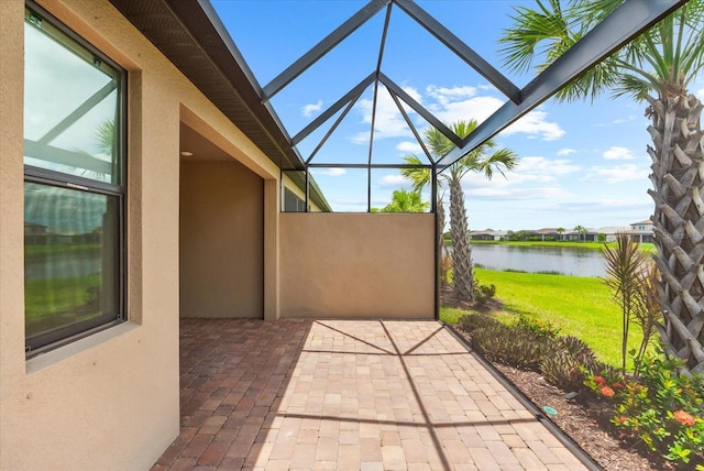 7661 Summerland Cv, Bradenton, FL 34202 - view of patio featuring a water view and a lanai
