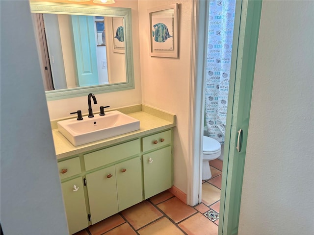 3767 Pinstar Ter, North Port, FL 34287 - full bathroom featuring vanity, tile patterned flooring, and a shower with shower curtain