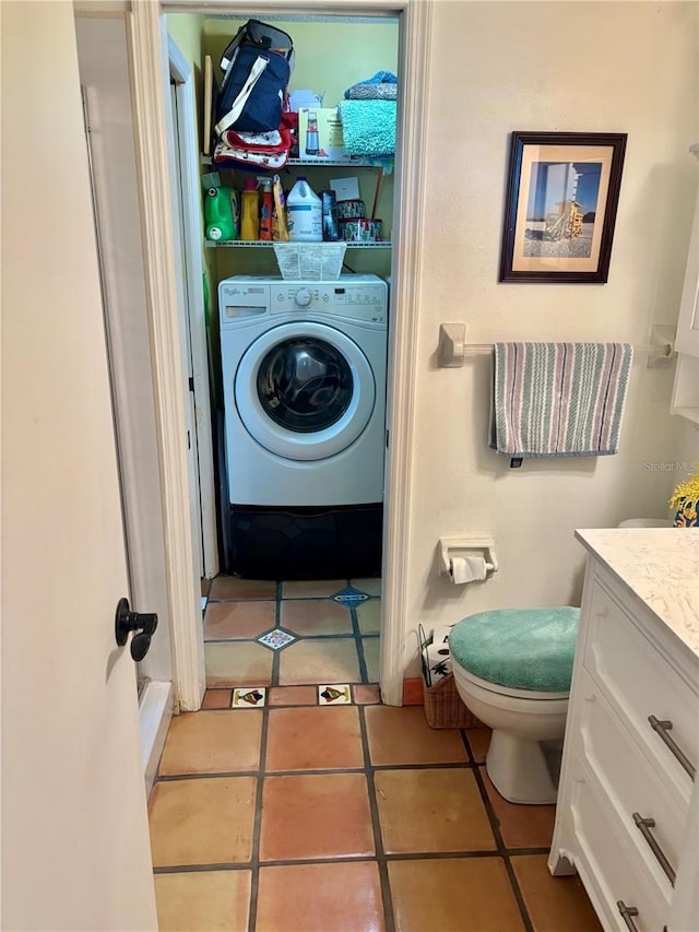 3767 Pinstar Ter, North Port, FL 34287 - laundry area with washer / clothes dryer and tile patterned floors