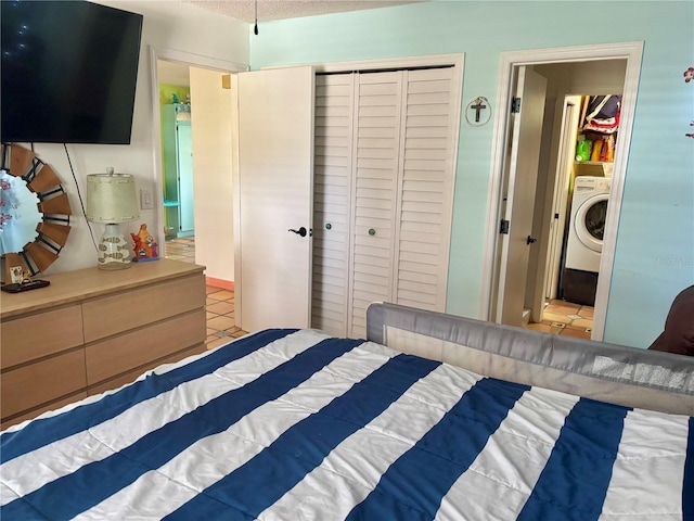 3767 Pinstar Ter, North Port, FL 34287 - bedroom featuring washer / clothes dryer and a closet