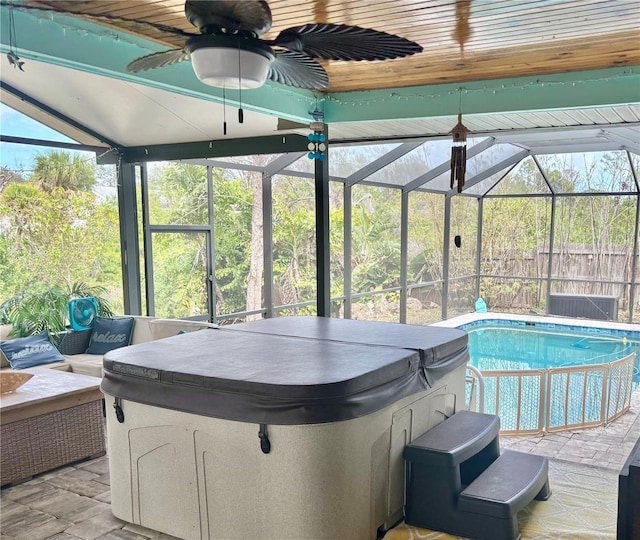 3767 Pinstar Ter, North Port, FL 34287 - swimming pool featuring a hot tub, a lanai, and a patio area