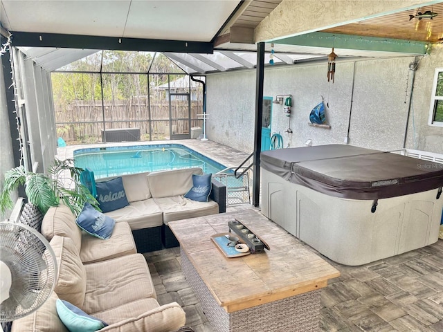 3767 Pinstar Ter, North Port, FL 34287 - view of patio / terrace featuring a hot tub, an outdoor living space, and glass enclosure
