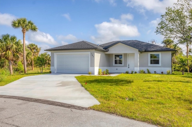 102 Arrow Ln, Rotonda West, FL 33947 - ranch-style home with an attached garage, driveway, stucco siding, and a front yard