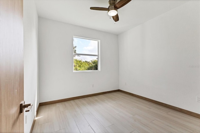 102 Arrow Ln, Rotonda West, FL 33947 - spare room featuring ceiling fan and light wood-style floors