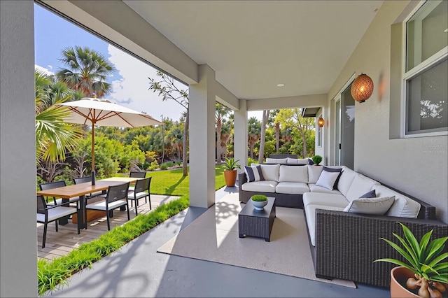 102 Arrow Ln, Rotonda West, FL 33947 - view of patio / terrace with outdoor dining area and an outdoor living space