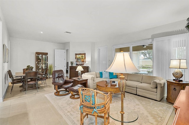 5662 Fossano Dr, Sarasota, FL 34238 - living area with light tile patterned floors