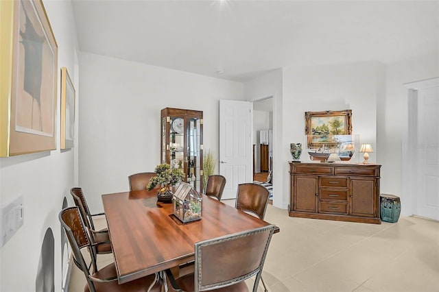 5662 Fossano Dr, Sarasota, FL 34238 - dining area with light tile patterned floors