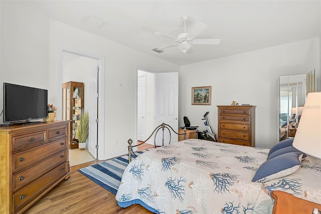 5662 Fossano Dr, Sarasota, FL 34238 - bedroom featuring light wood-style flooring and a ceiling fan