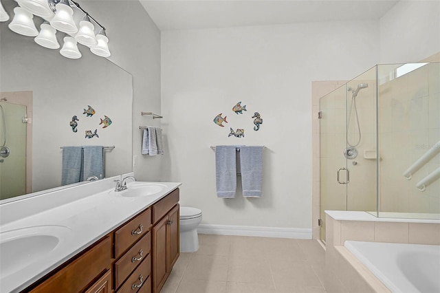 5662 Fossano Dr, Sarasota, FL 34238 - bathroom with a shower stall, double vanity, tile patterned floors, and a garden tub