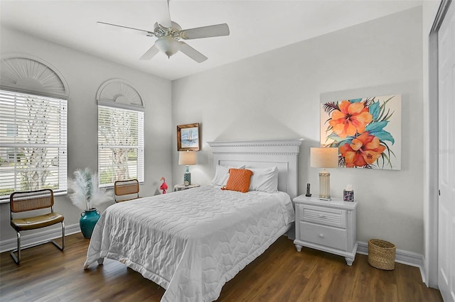 5662 Fossano Dr, Sarasota, FL 34238 - bedroom with dark wood-type flooring and a ceiling fan