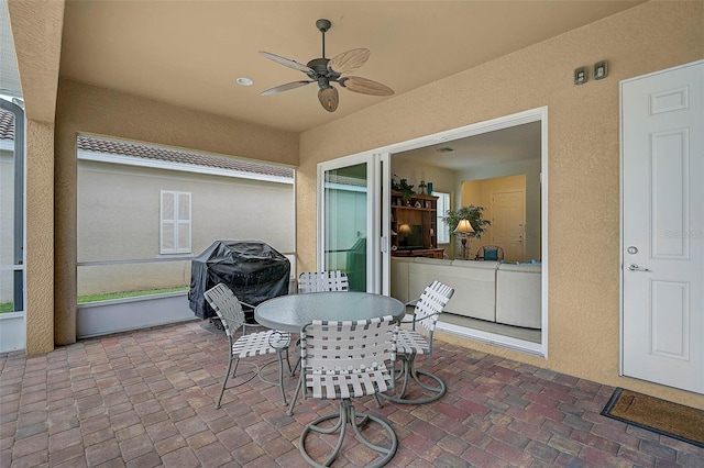 5662 Fossano Dr, Sarasota, FL 34238 - view of patio / terrace with ceiling fan, area for grilling, and outdoor dining area