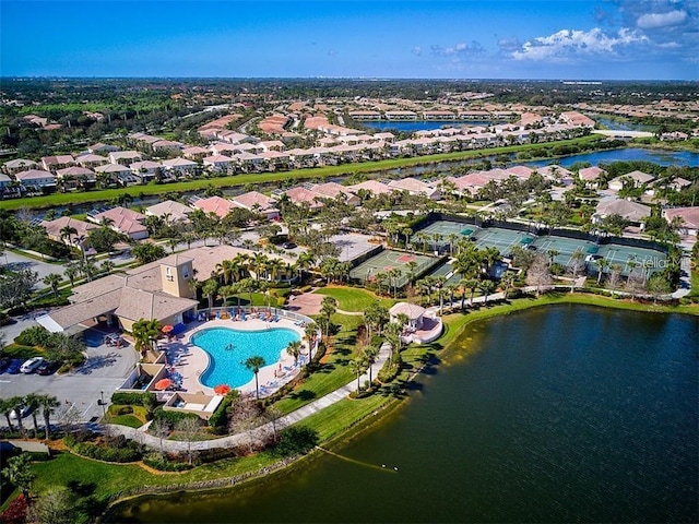 5662 Fossano Dr, Sarasota, FL 34238 - aerial view of property and surrounding area with nearby suburban area and a nearby body of water