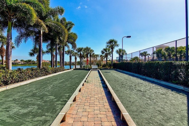 5662 Fossano Dr, Sarasota, FL 34238 - surrounding community featuring a game area and a water view