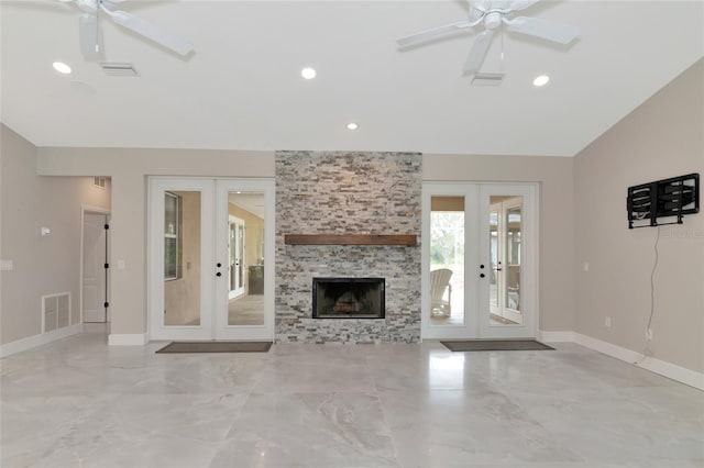 920 Lena Ln, Sarasota, FL 34240 - unfurnished living room featuring french doors, ceiling fan, marble tiled flooring, recessed lighting, and vaulted ceiling