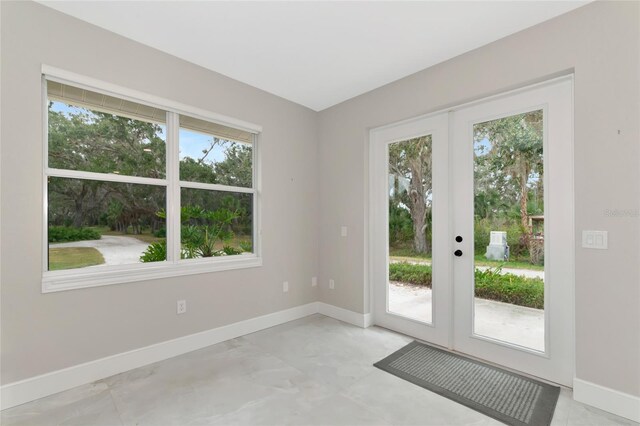 920 Lena Ln, Sarasota, FL 34240 - doorway to outside with french doors and plenty of natural light
