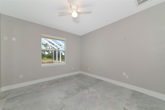 920 Lena Ln, Sarasota, FL 34240 - empty room with light marble finish flooring and a ceiling fan