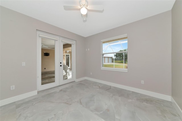 920 Lena Ln, Sarasota, FL 34240 - empty room featuring french doors and a ceiling fan