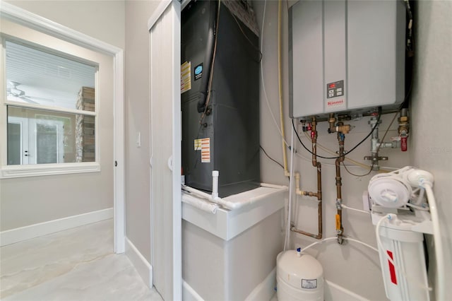 920 Lena Ln, Sarasota, FL 34240 - utility room with tankless water heater