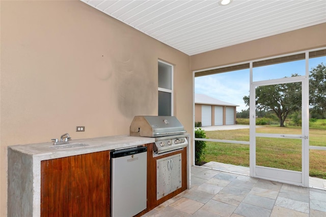 920 Lena Ln, Sarasota, FL 34240 - unfurnished sunroom featuring area for grilling and a sink
